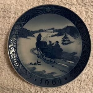 1964 Royal Copenhagen Christmas plate titled "Fetching the Christmas Tree”.